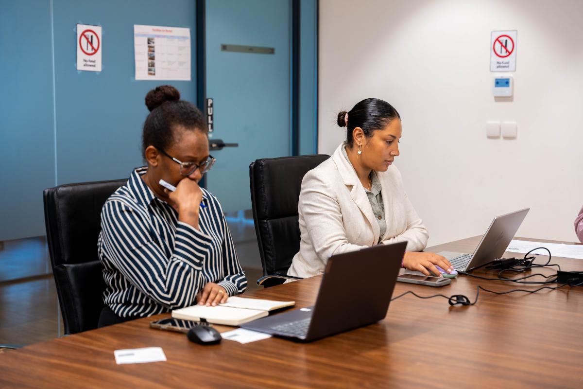 Clerk Mrs. Tania Isaac and Deputy Clerk Ms. Alexandria Faure