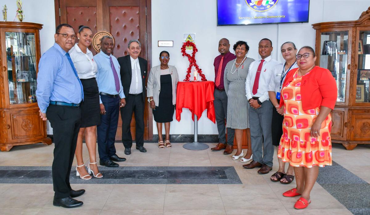 A group photo of the committee with the speaker