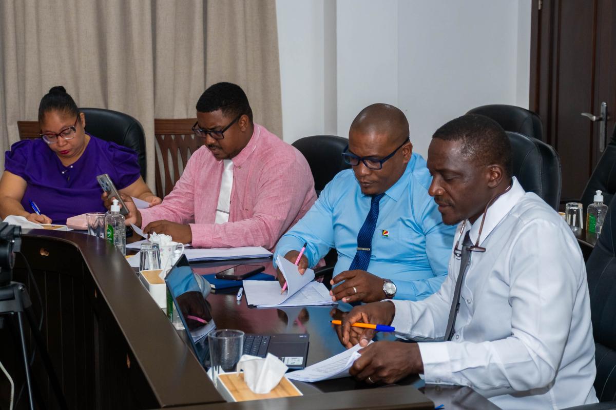 Photo of members at the table