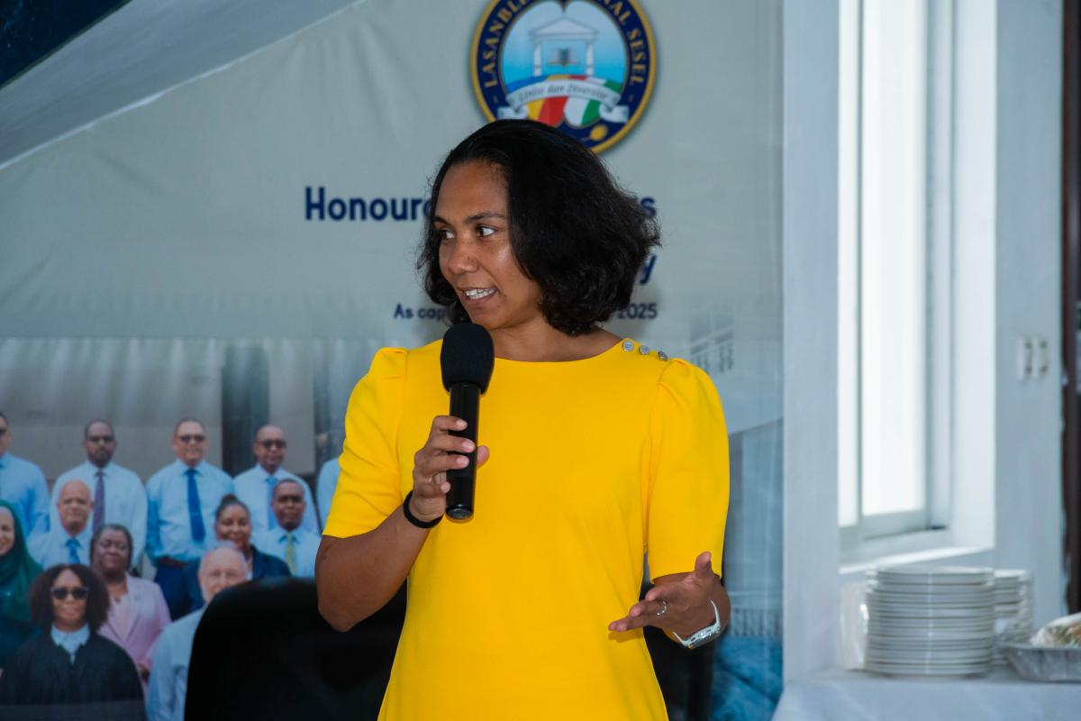 Minister Belle addressing the crowd