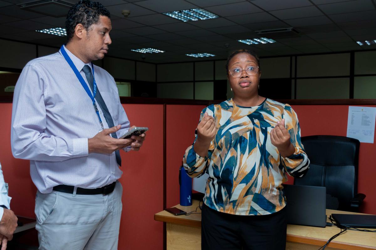 Hon. Wavel Woodcock and DICT Technical Staff