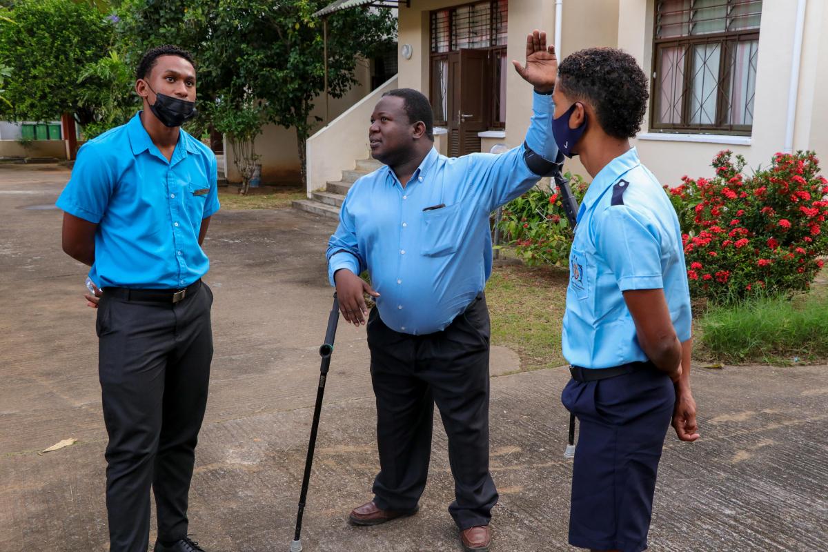 Hon Zialor Talking to some students