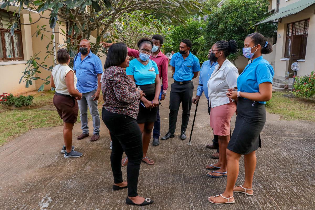 The Members discussing with the students