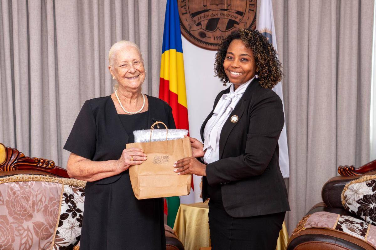 Speaker presenting a token of appreciation